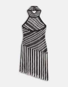 Model wearing Knitted stripe halterneck longline fringing tunic in black and white