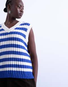 Model wearing Knitted stripe vintage vest in blue