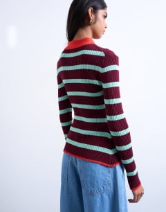 Model wearing Knitted striped collar polo in burgundy and green