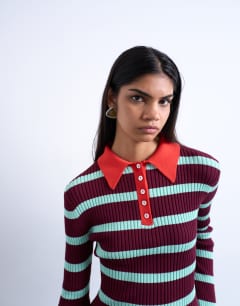 Model wearing Knitted striped collar polo in burgundy and green