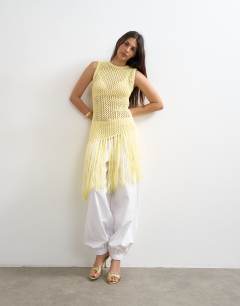 Model wearing Knitted tape fish net scoop neck top in yellow