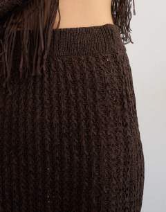 Model wearing Knitted tape yarn co-ord maxi in chocolate