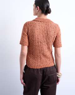 Model wearing Knitted tape yarn polo in rust