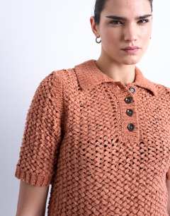 Model wearing Knitted tape yarn polo in rust