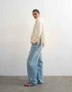 Model wearing Knitted tassel jumper in ivory