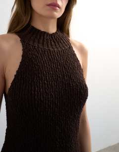 Model wearing Knitted textured grown on vest in chocolate
