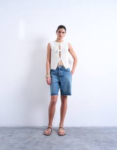 Model wearing Knitted textured tie front waistcoat in ivory