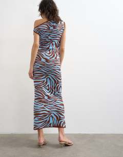 Model wearing Knitted textured twist detail off shoulder maxi dress in brown animal print