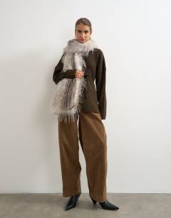 Model wearing Knitted tie back all needle cardigan in brown