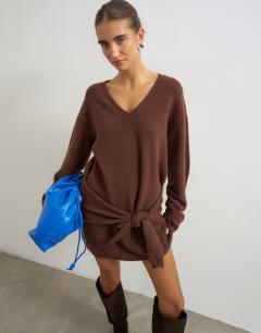 Model wearing Knitted tie front long line mini jumper dress in deep mahogany