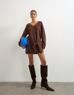 Model wearing Knitted tie front long line mini jumper dress in deep mahogany