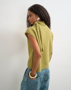 Model wearing Knitted tie neck top in green