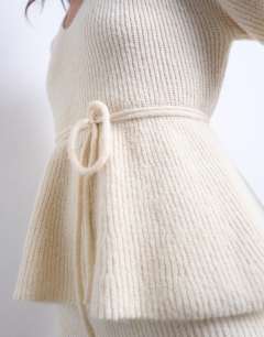 Model wearing Knitted tie waist peplum co-ord top in ivory