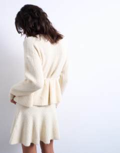 Model wearing Knitted tie waist peplum co-ord top in ivory