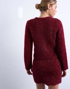Model wearing Knitted tinsel cardigan in burgundy