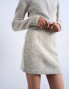 Model wearing Knitted twist yarn co-ord skirt in blue and yellow