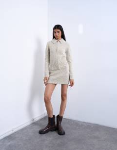 Model wearing Knitted twist yarn co-ord skirt in blue and yellow