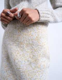 Model wearing Knitted twist yarn co-ord skirt in blue and yellow