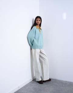 Model wearing Knitted twist yarn contrast collar polo in blue