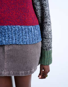 Model wearing Knitted twist yarn patchwork volume sleeve jumper
