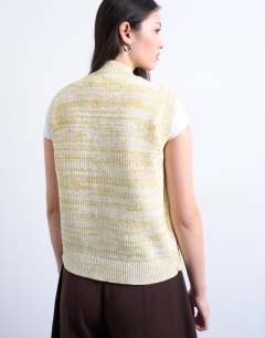 Model wearing Knitted twist yarn waistcoat in chartreuse yellow