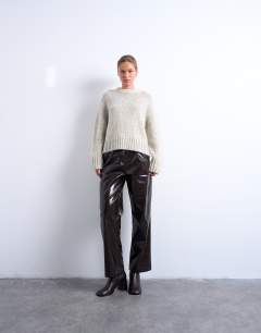 Model wearing Knitted twisted fluffy boxy jumper in blue and yellow multi