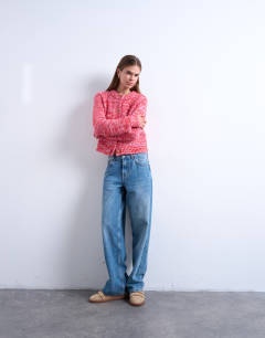 Model wearing Knitted twisted fluffy cardigan in pink