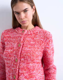 Model wearing Knitted twisted fluffy cardigan in pink