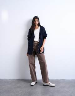 Model wearing Knitted ultimate boyfriend cardigan in Navy