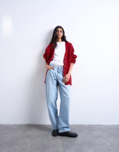 Model wearing Knitted ultimate boyfriend cardigan in red