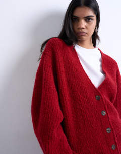 Model wearing Knitted ultimate boyfriend cardigan in red
