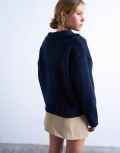 Model wearing Knitted v neck collar jumper in navy
