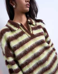 Model wearing Knitted v neck fluffy polo in green and brown