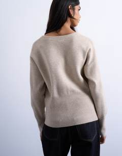 Model wearing Knitted V neck longline clean cinch waist cardigan in oat