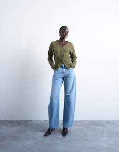 Model wearing Knitted V neck longline compact fitted waist cardigan in green
