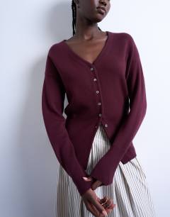 Model wearing Knitted V neck longline compact fitted waist cardigan in plum