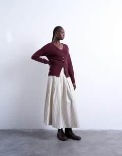Model wearing Knitted V neck longline compact fitted waist cardigan in plum
