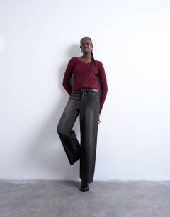 Model wearing Knitted v-neck ribbed cardigan in burgundy