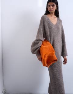 Model wearing Knitted v neck slouchy midi dress in chocolate