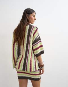 Model wearing Knitted vertical stripe co-ord polo top in multi
