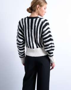 Model wearing Knitted vetical stripe cardigan in mono