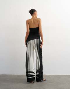 Model wearing Knitted wide leg trouser in black and ecru