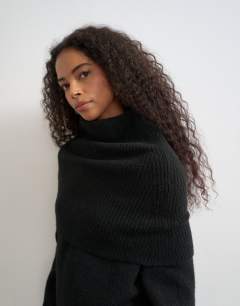 Model wearing Knitted wool blend deep fold bardot jumper in black
