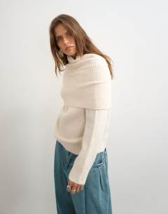 Model wearing Knitted wool blend deep fold bardot jumper in ivory