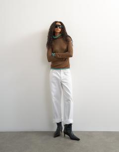 Model wearing Knitted wool blend double layer sheer turtleneck top in blue and brown multi