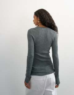 Model wearing Knitted wool blend henley long sleeve top in charcoal