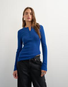 Model wearing Knitted wool blend henley long sleeve top in cobalt