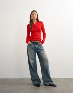 Model wearing Knitted wool blend henley long sleeve top red
