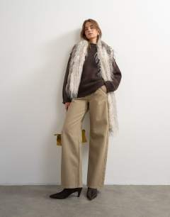 Model wearing Knitted wool blend roll edge chunky jumper in chocolate