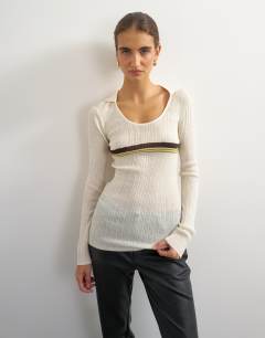 Model wearing Knitted wool blend scoop neck collared rib top in ecru stripe